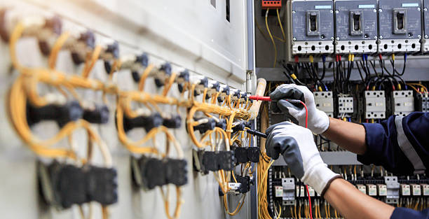 Professional Electrician technician working in Sharpes, FL